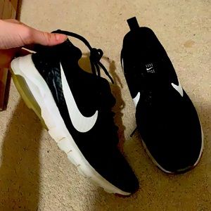 Size 7 black and white Nike running sneakers